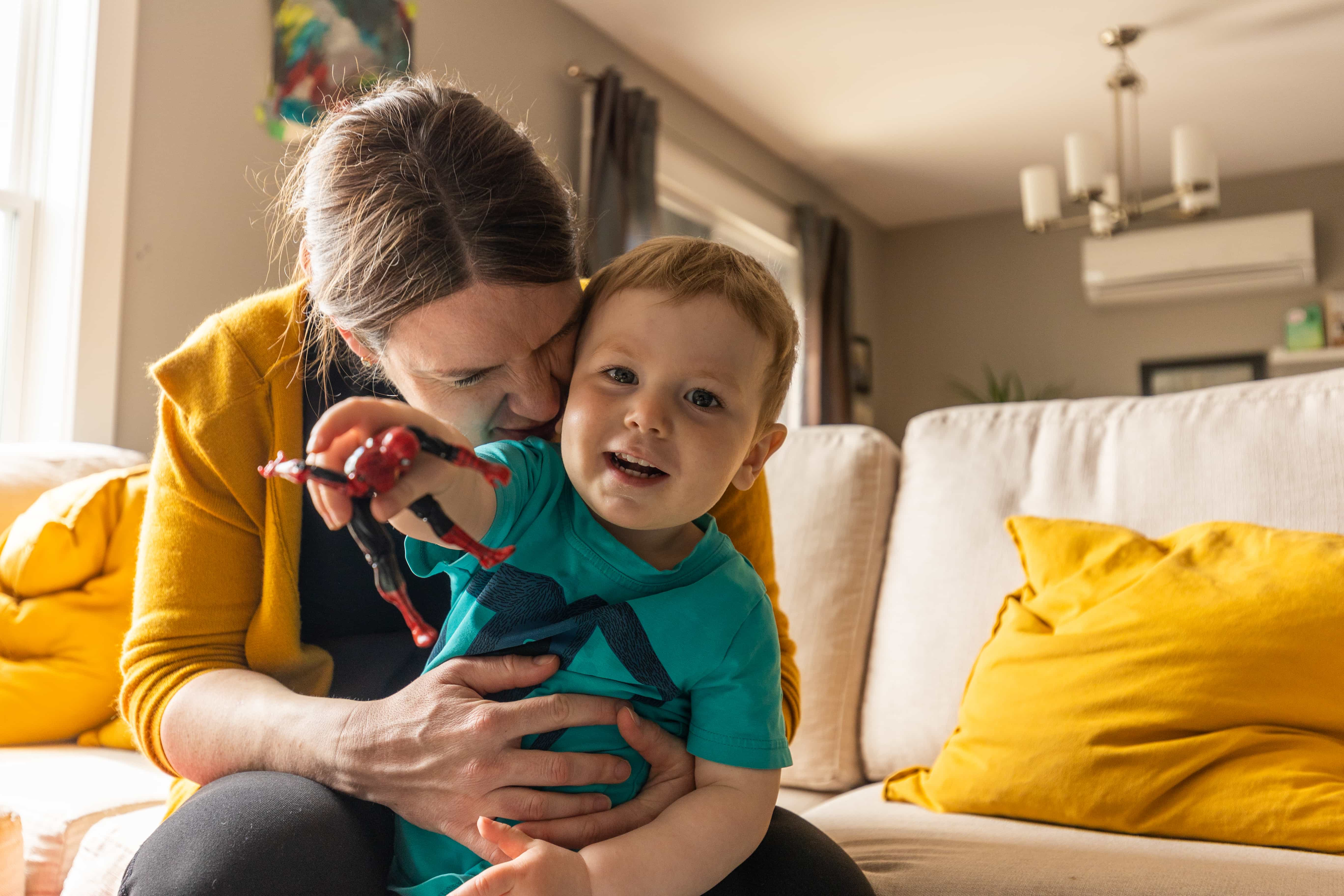 A mother holding a child